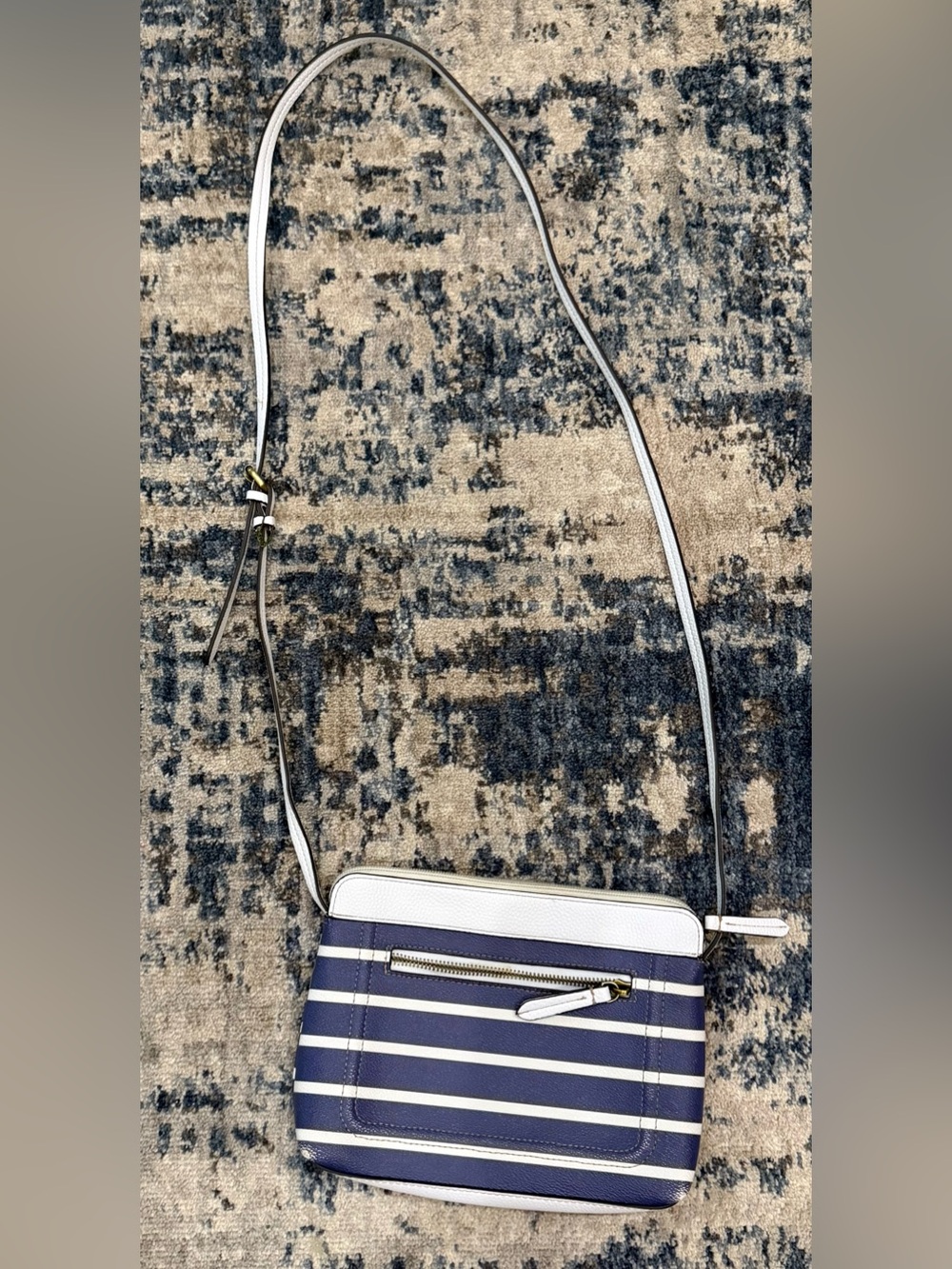 St. John's Bay striped faux leather crossbody bag.